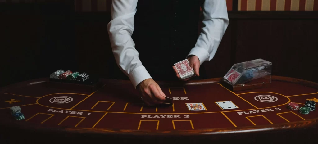 blackjack table with a dealer